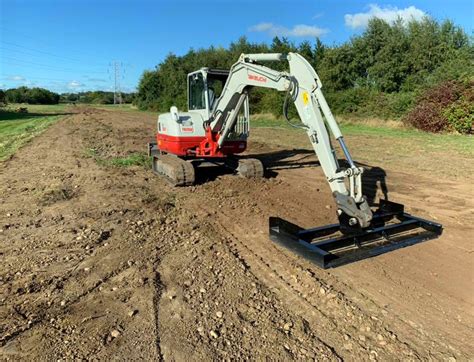 grading with mini excavator blade|Grading Beams .